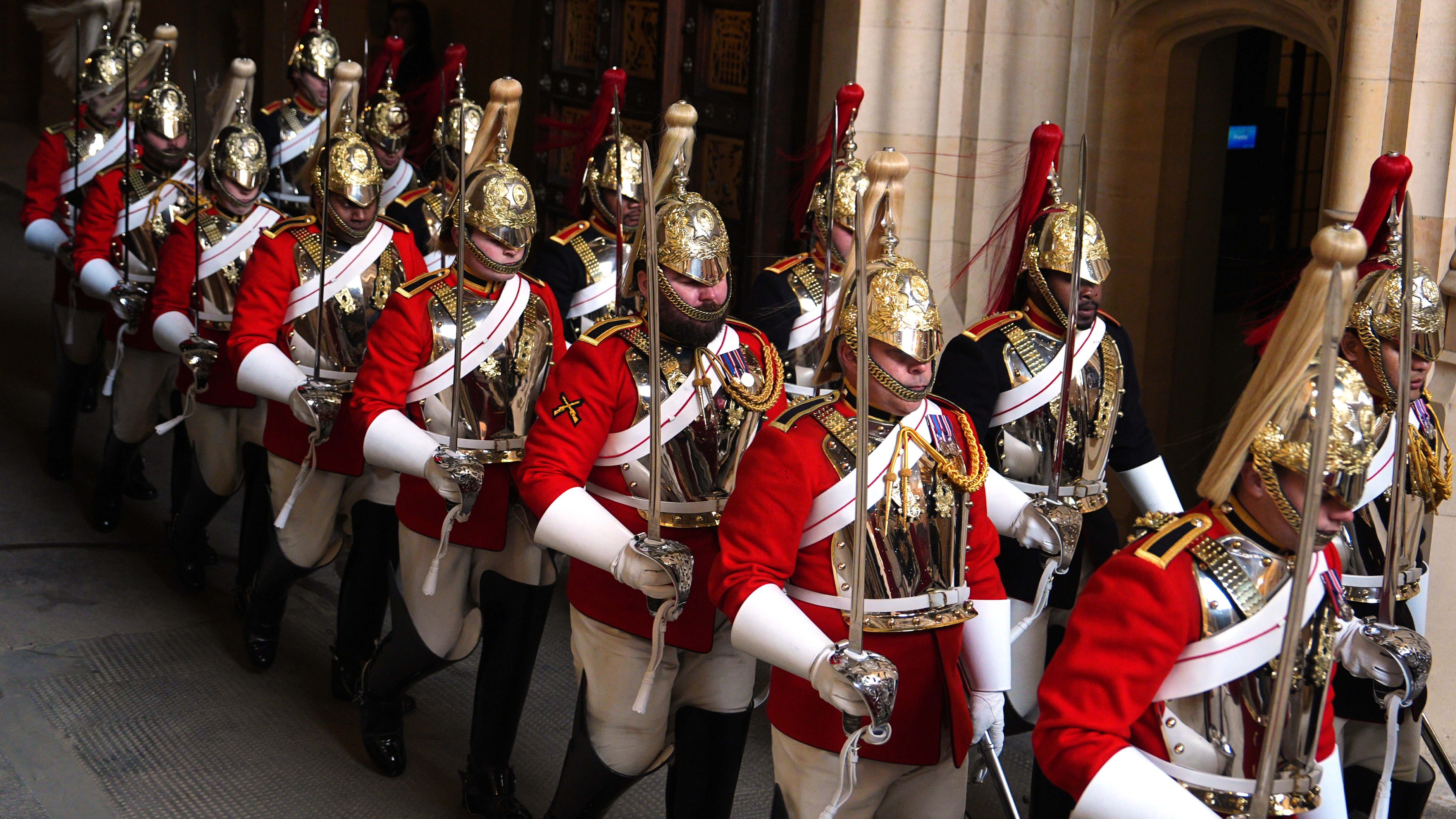 Members of The Life Guards await the arrival of King Charles III and Queen Camilla at the Sovereign's Entrance (Picture: PA)