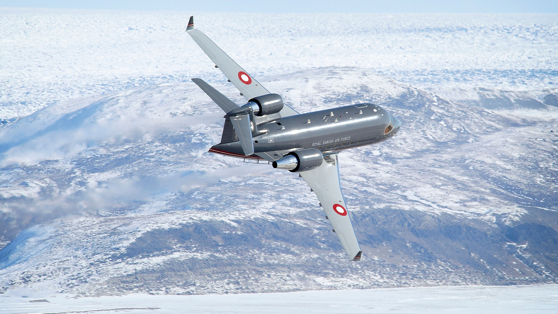 A Challenger CL-604 flying over Greenland