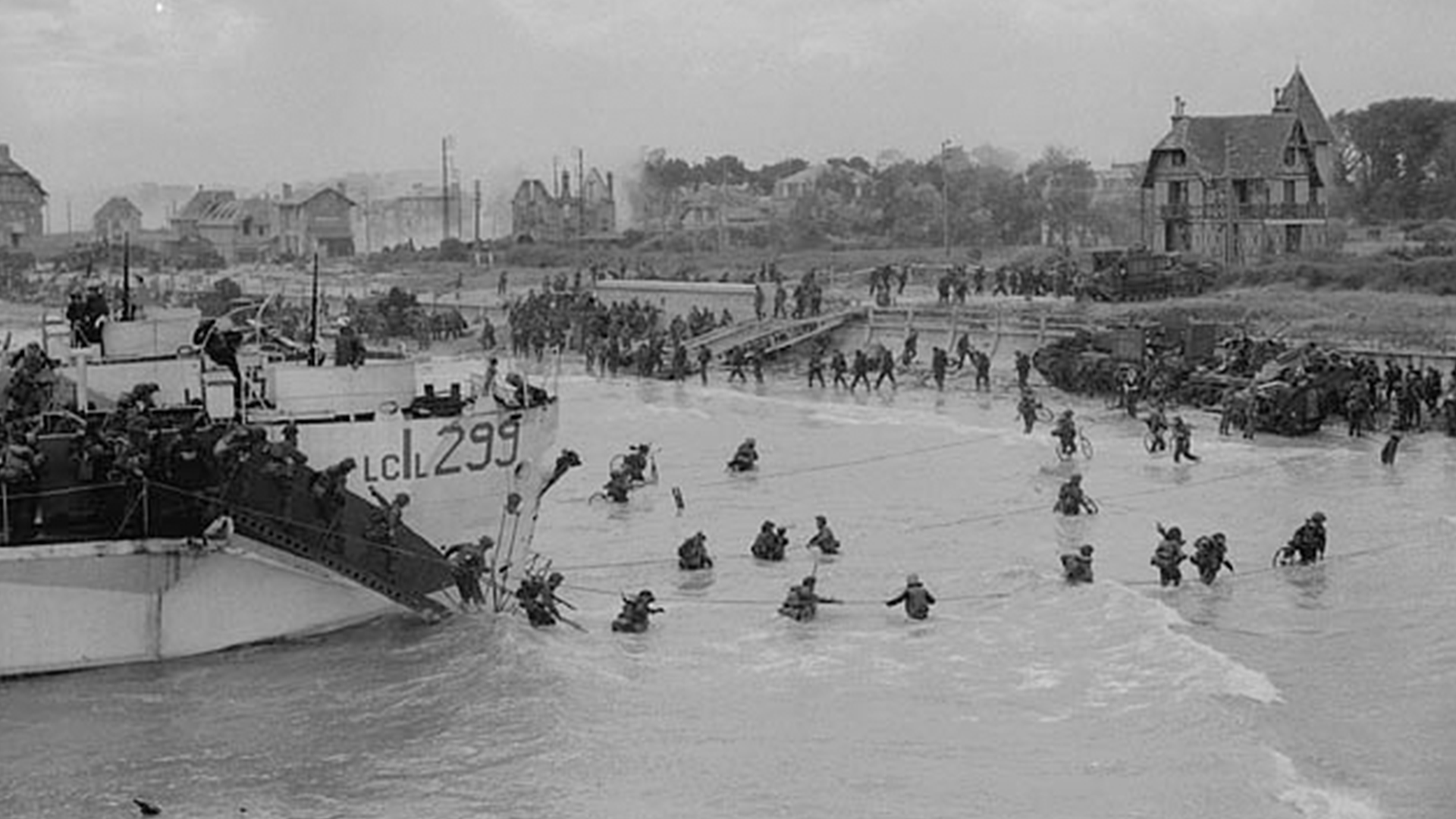 Personnel of the 9th Canadian Infantry Brigade landing on D-Day CREDIT Gilbert Alexander Milne. Canada. Department of National Defence.