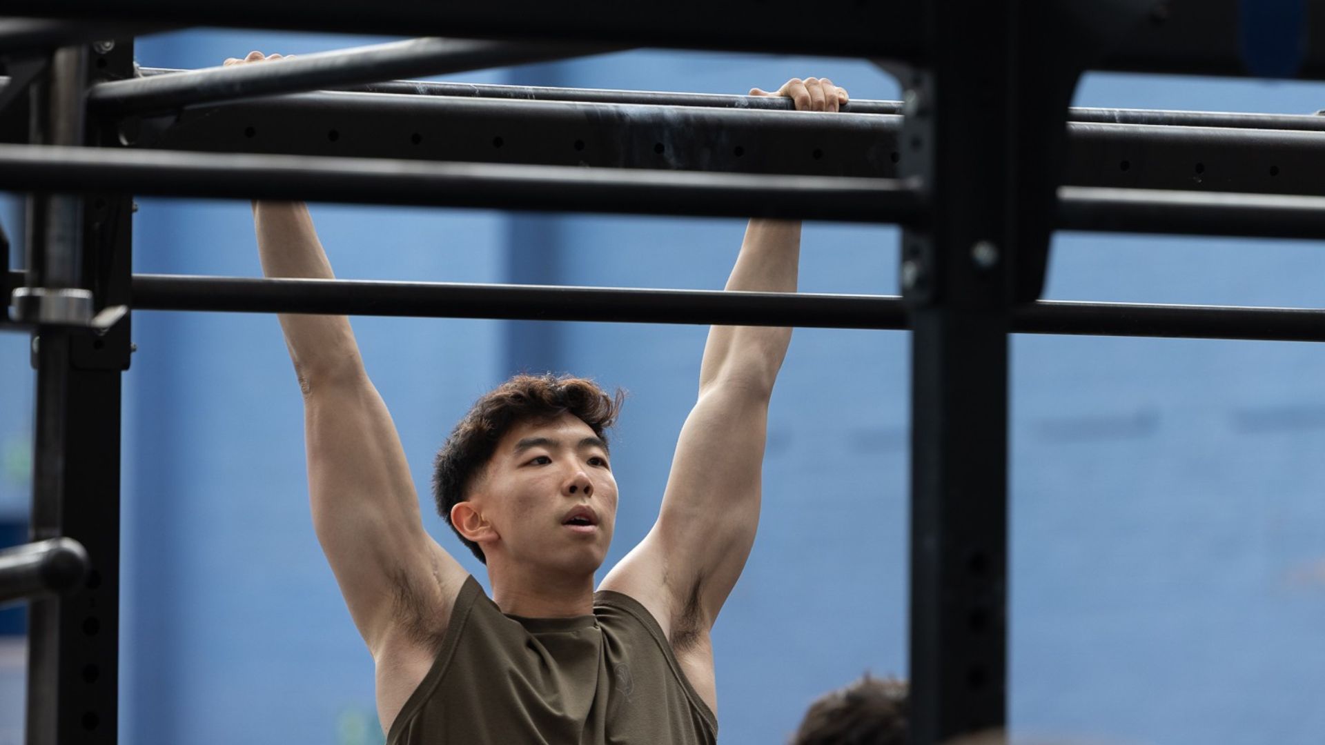 Competitors were required to perform strict pull-ups, as opposed to the standard kipping technique