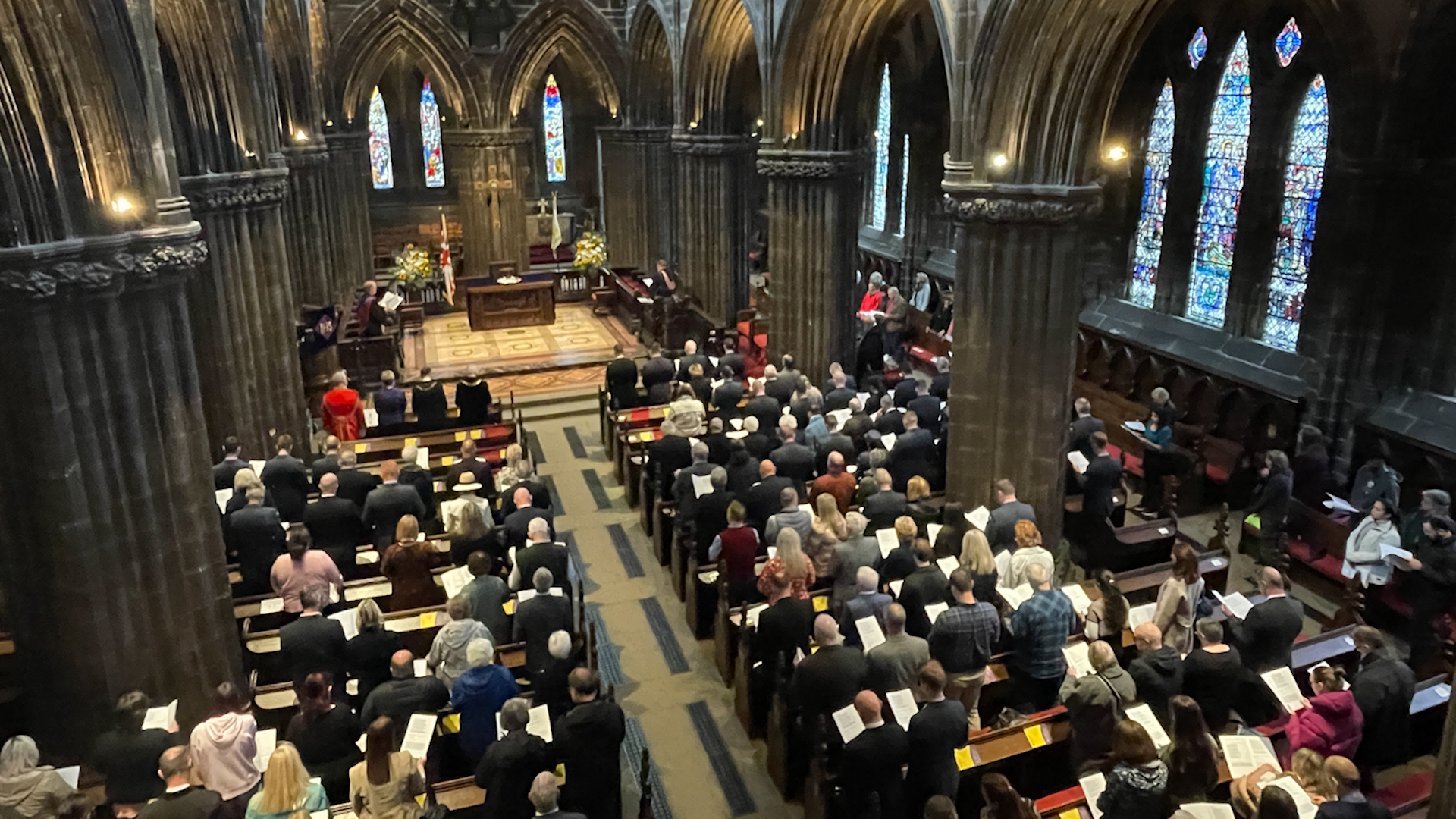 People in Glasgow Cathedral marking the anniversaries of the Battle of Britain and 602 Squadron