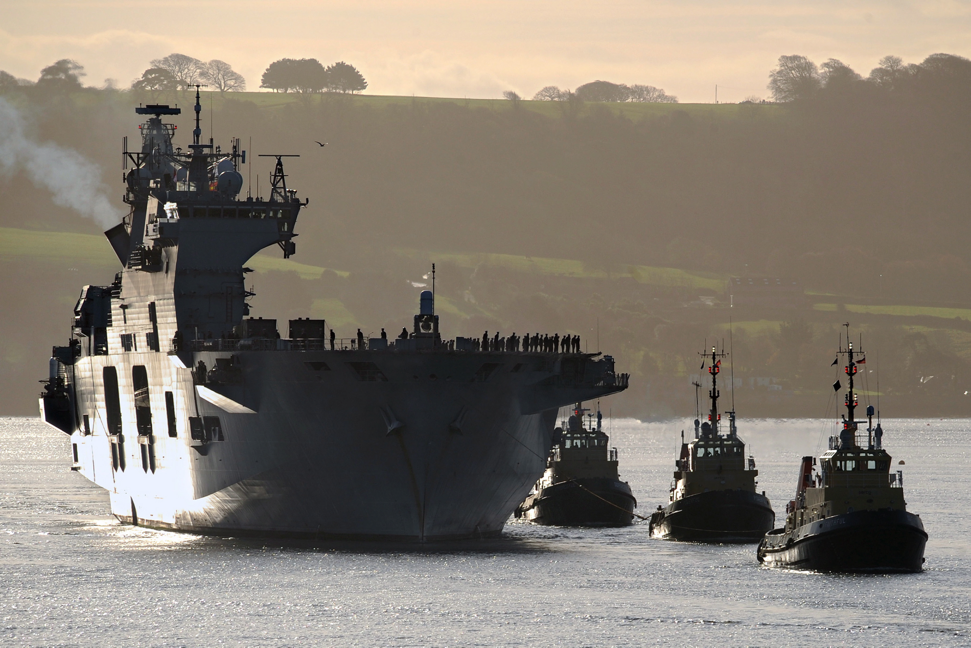 HMS Ocean returns to Plymouth Sound from an eight month deployment off Libya.
