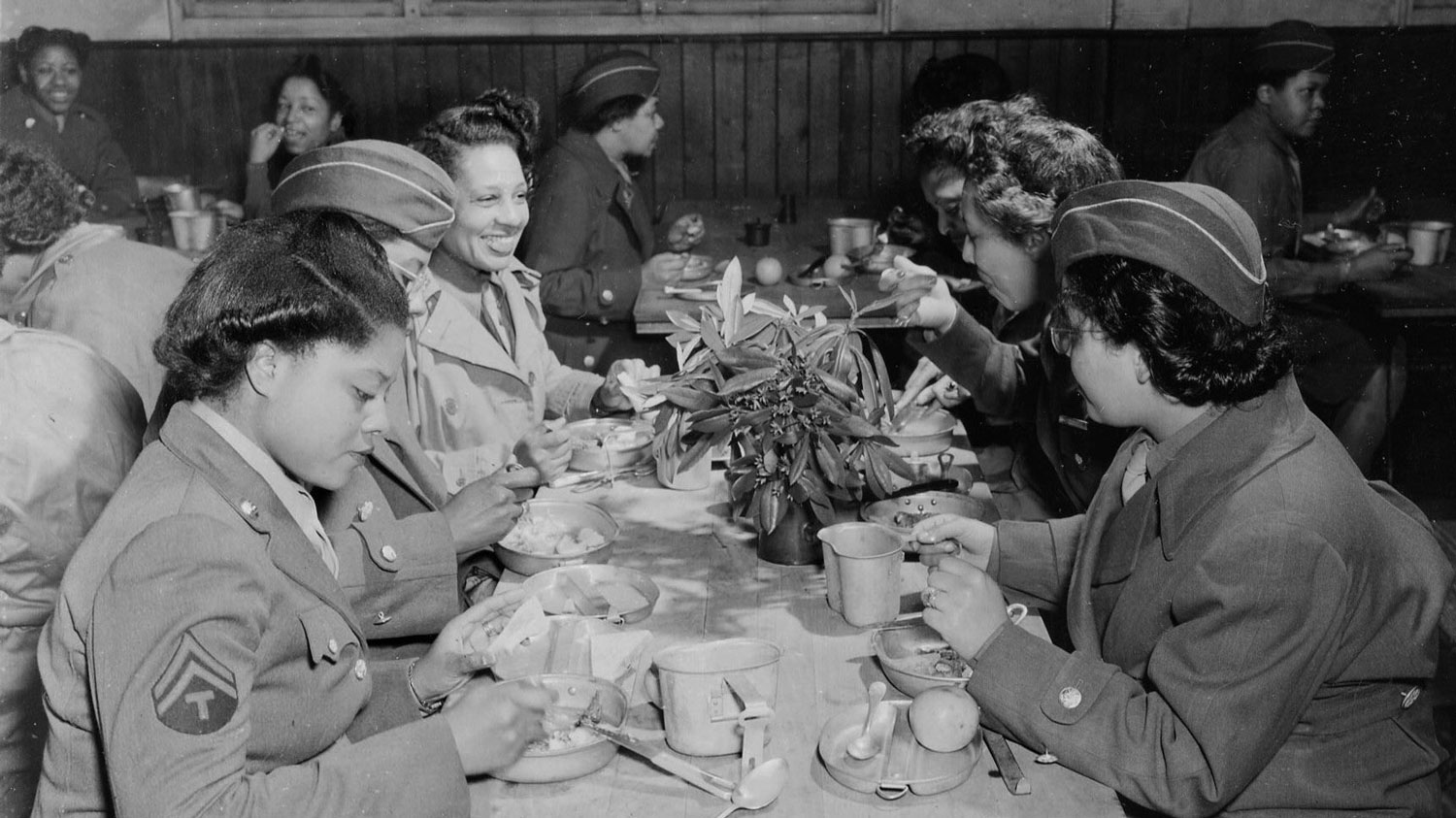 6888th Central Postal Directory Battalion AKA the Six Triple Eight eat together in the unit's mess hall in Birmingham 15 Feb 1945 CREDIT US Army