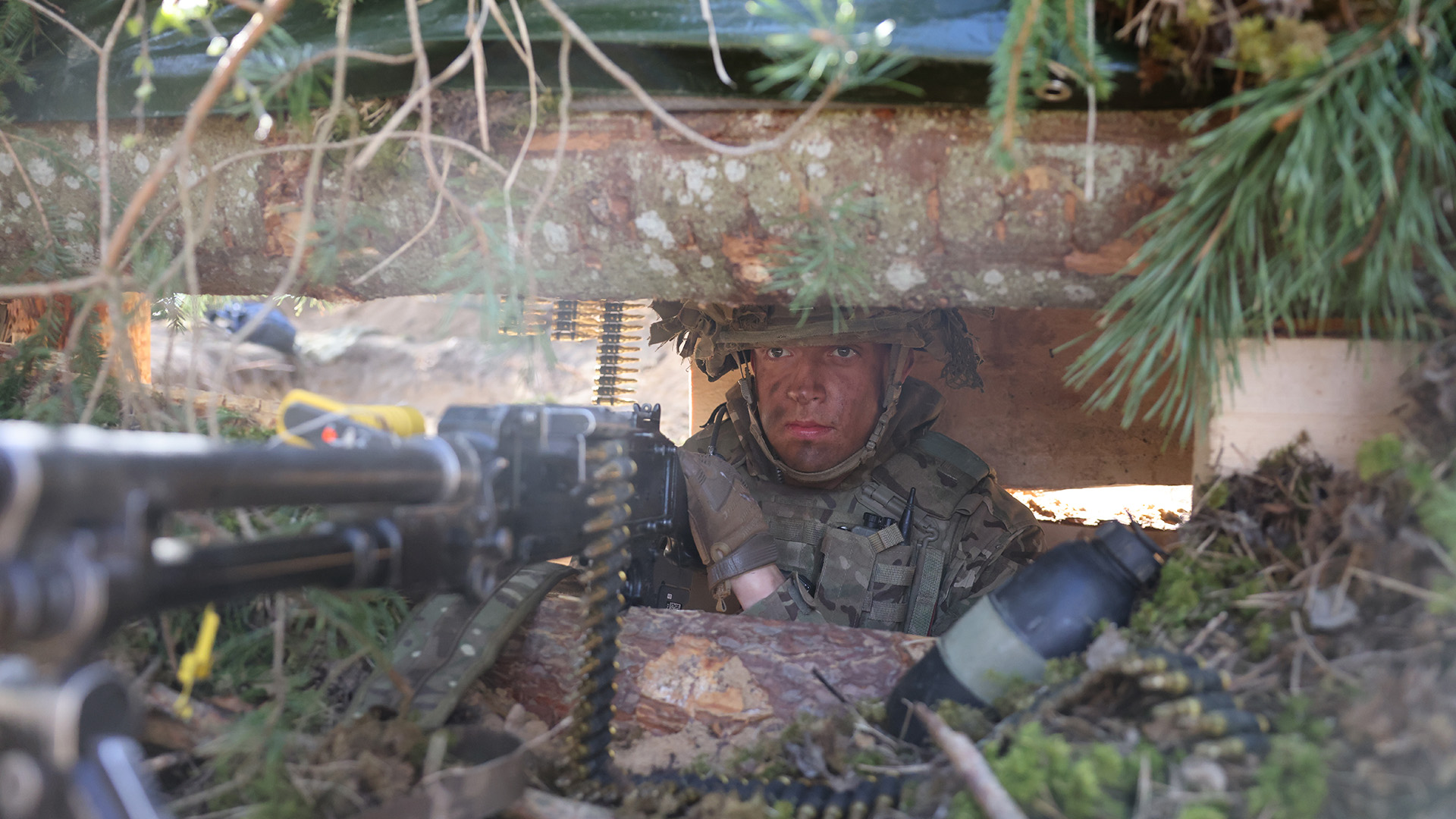 A soldier hides during Exercise Hedgehog in Estonian in May 2025