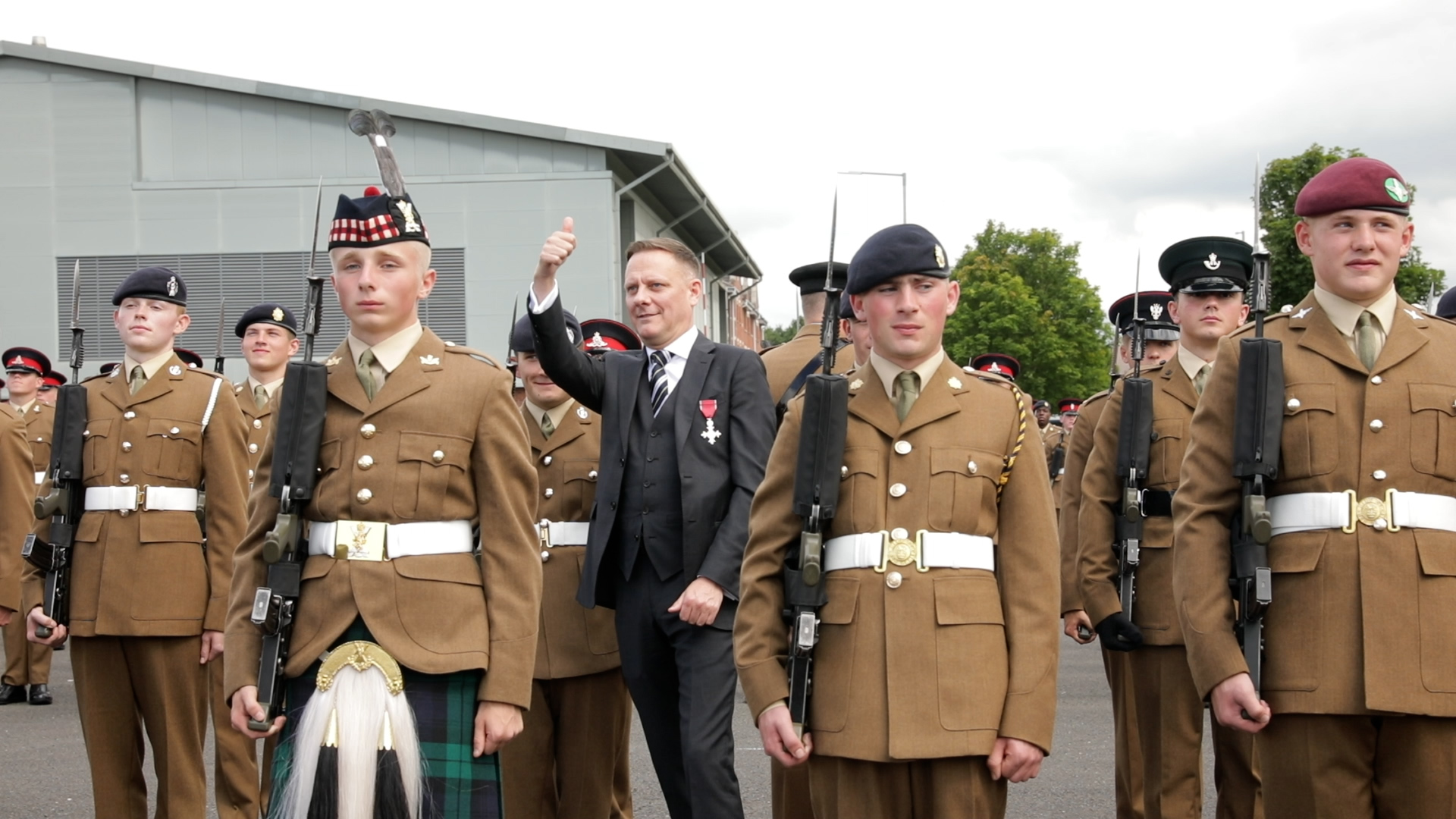 Antony Cotton talks to soldiers