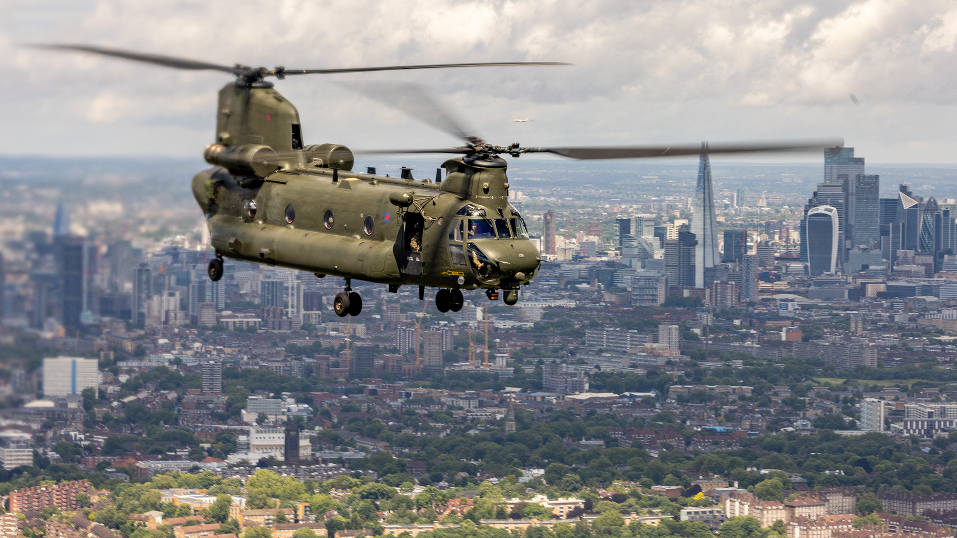At the front of the flypast were three Chinook helicopters CREDIT RAF