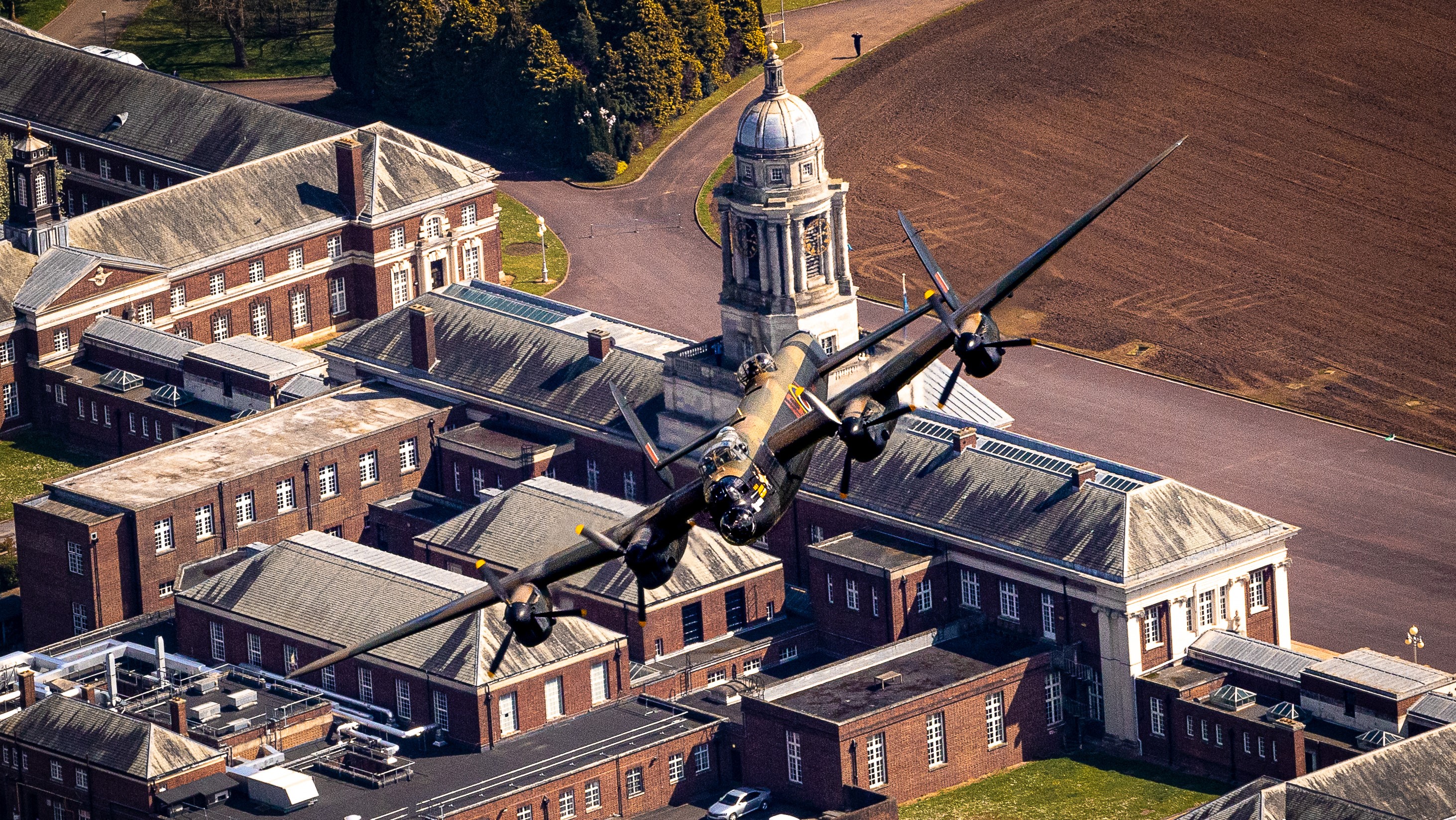 Avro Lancaster from The Battle of Britain Memorial Flight above RAF College Cranwell in a rehearsal Coronation Flypast 25042023 CREDIT MOD Crown Copyright.jpg