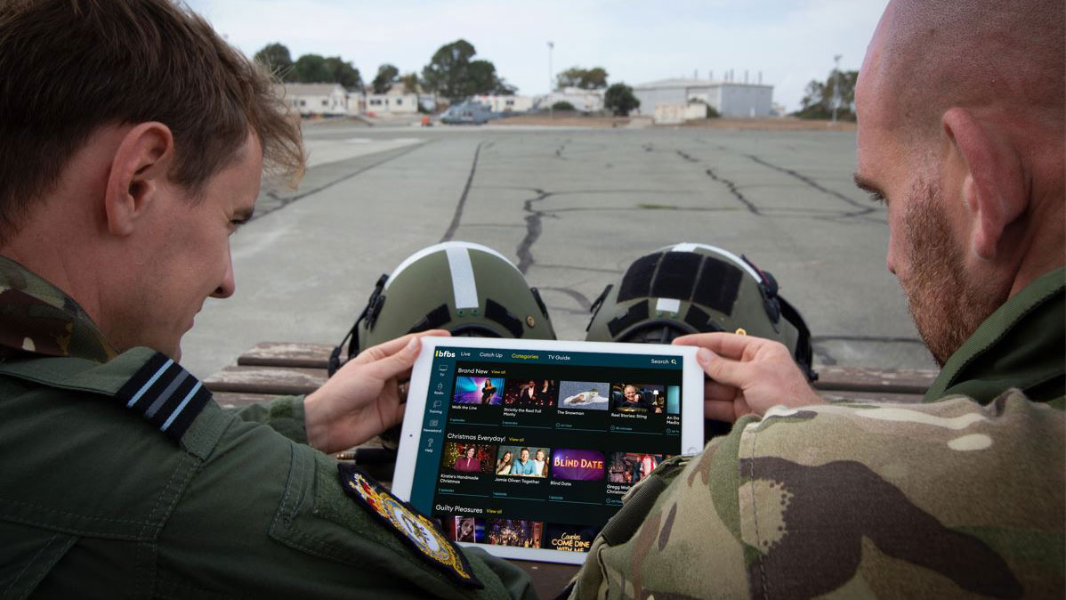 BFBS MiPlayer being enjoyed by two serving personnel CREDIT BFBS
