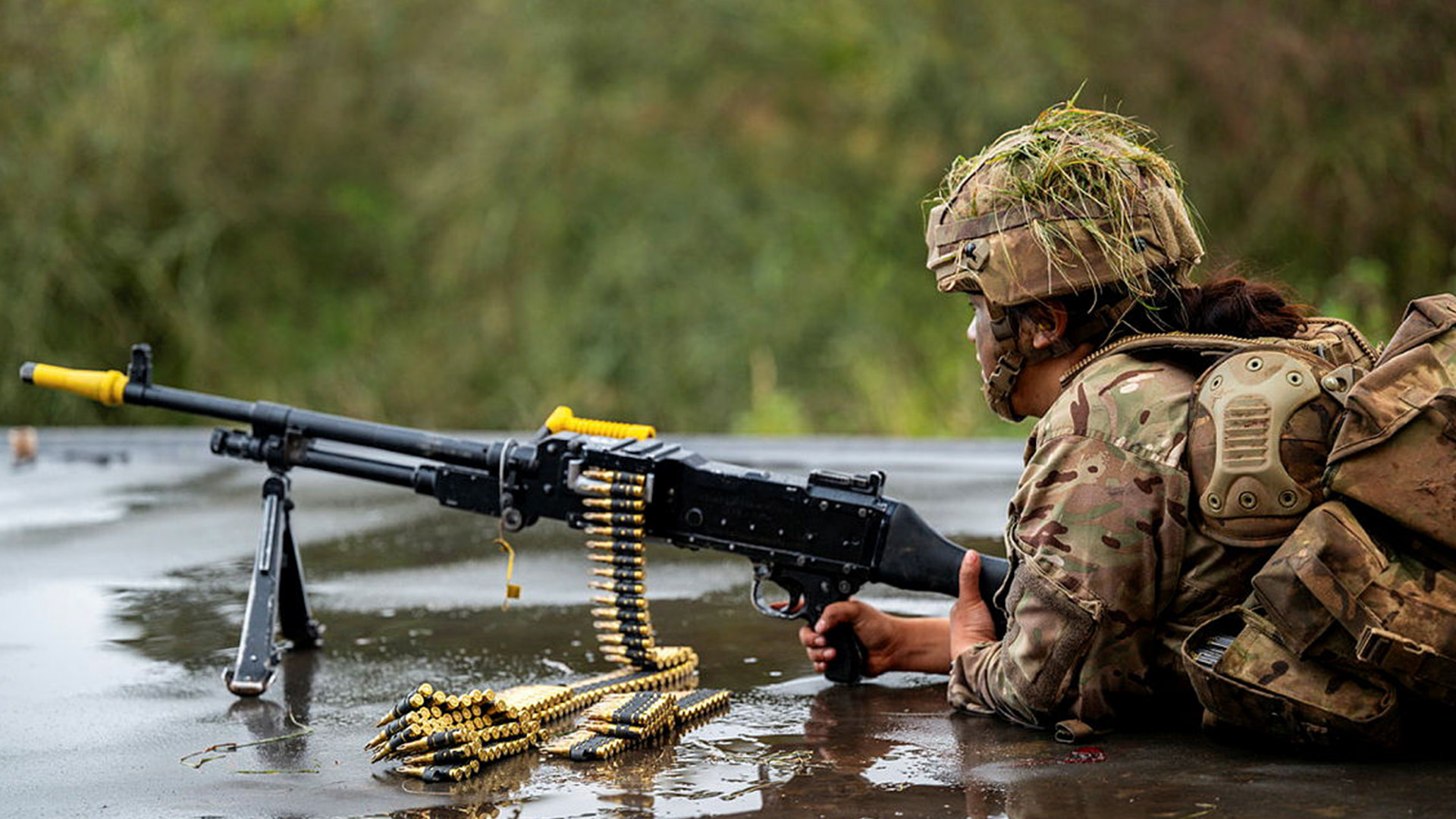This infanteer with her GPMG is wearing MTP uniform - which is worn by all three services