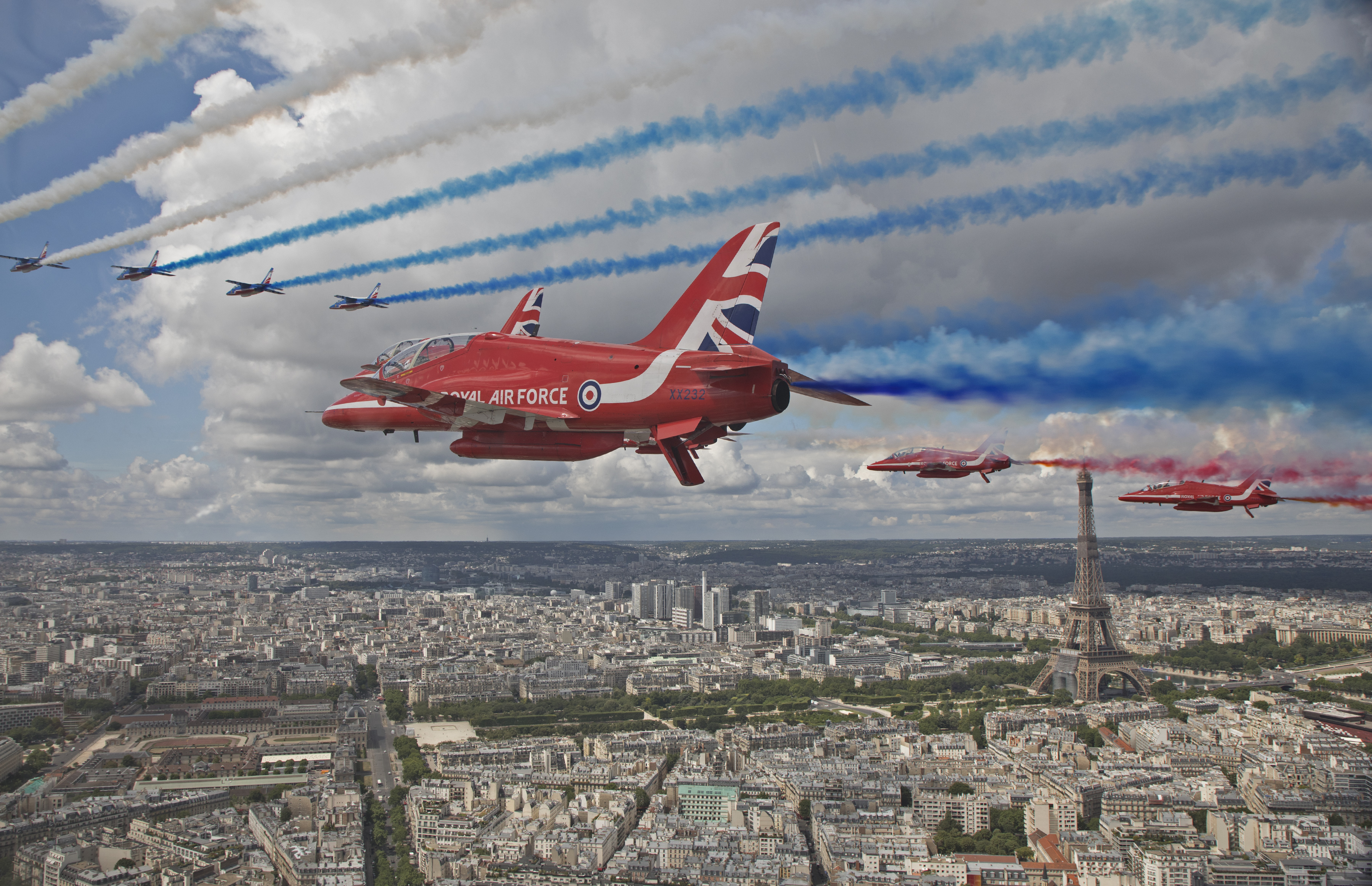 The Red Arrows and Patrouille de France flew together over Paris to mark the 80th anniversary of D-Day (Picture: MOD)