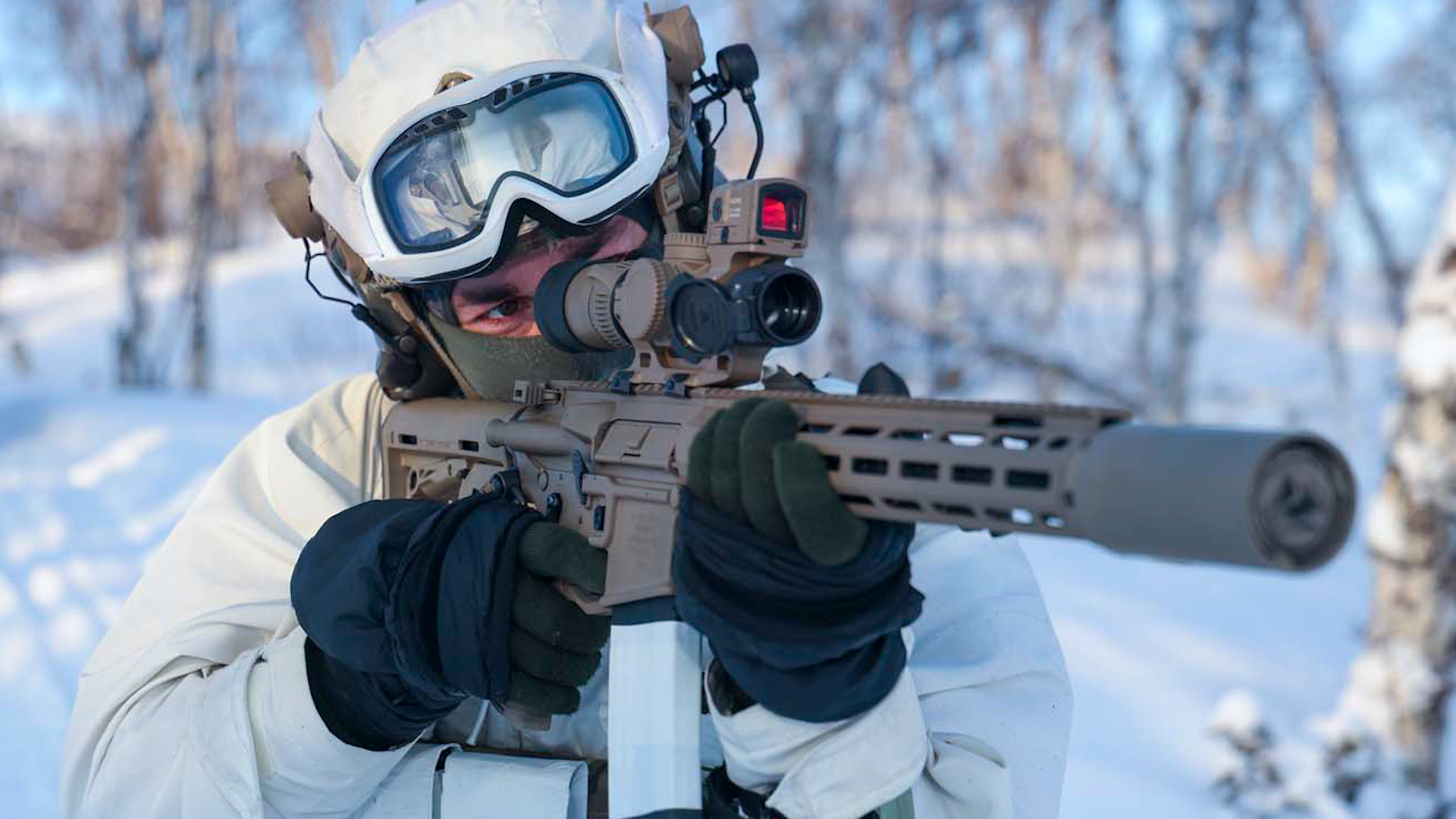 The KS-1, seen here in the hands of a Royal Marines Commando, is meant to be fired with the suppressor fitted as standard