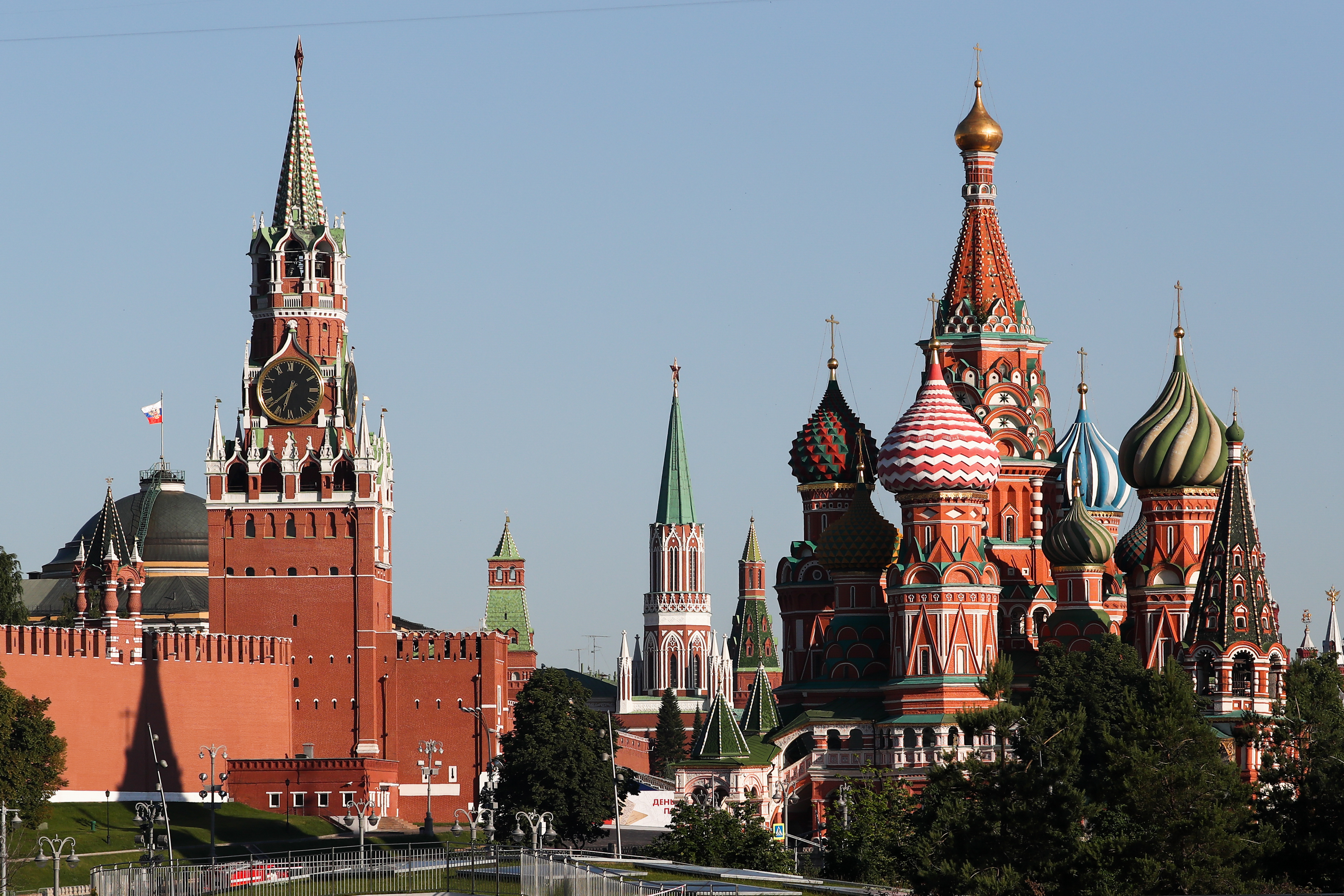 Moscow Kremlin's Spasskaya Tower and St Basil's Cathedral