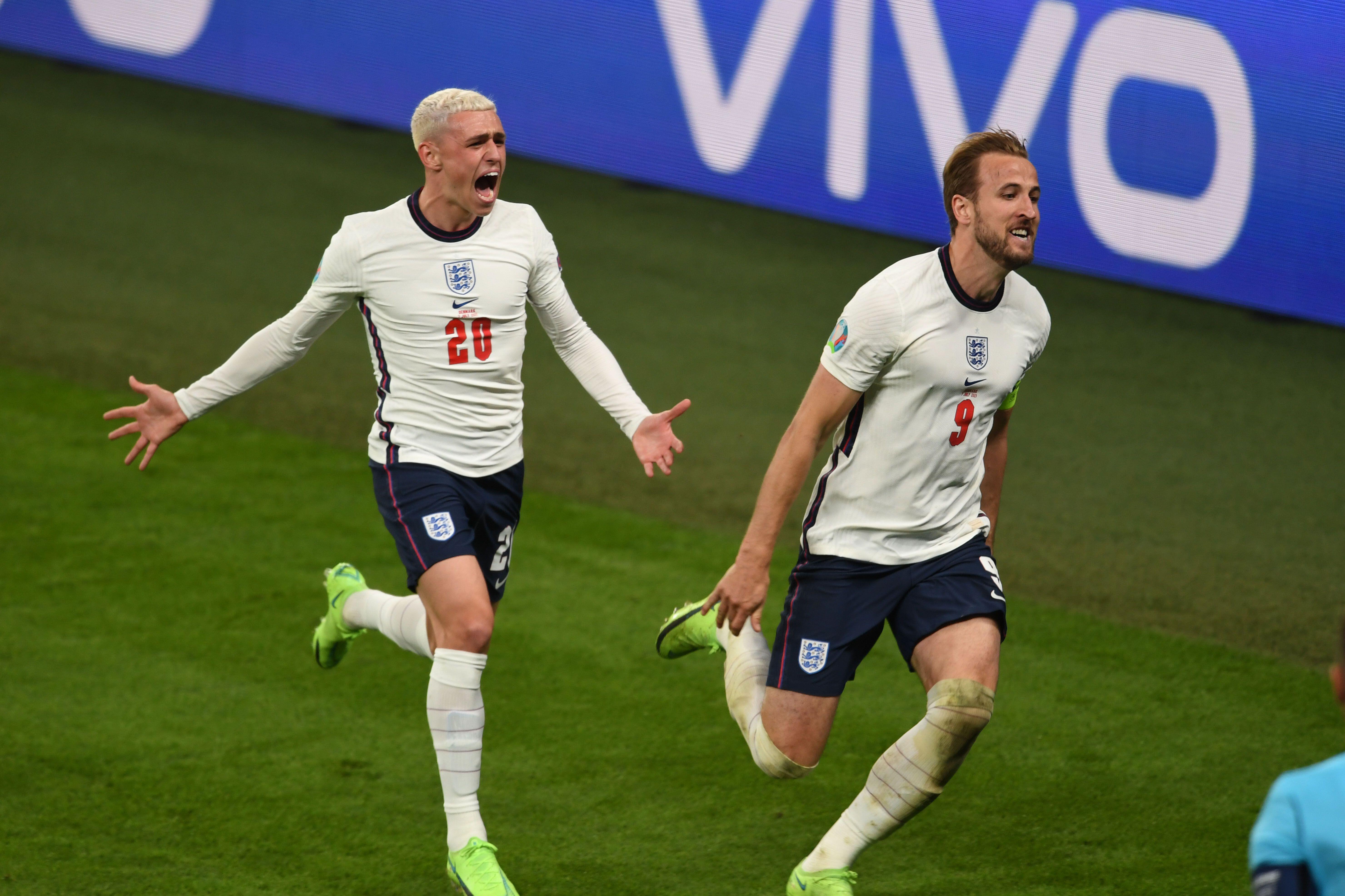 Phil Foden and Harry Kane celebrate England's second goal against Denmark in their Euro 2020 semi-final at Wembley Stadium 070721 CREDIT ALAMY.jpg