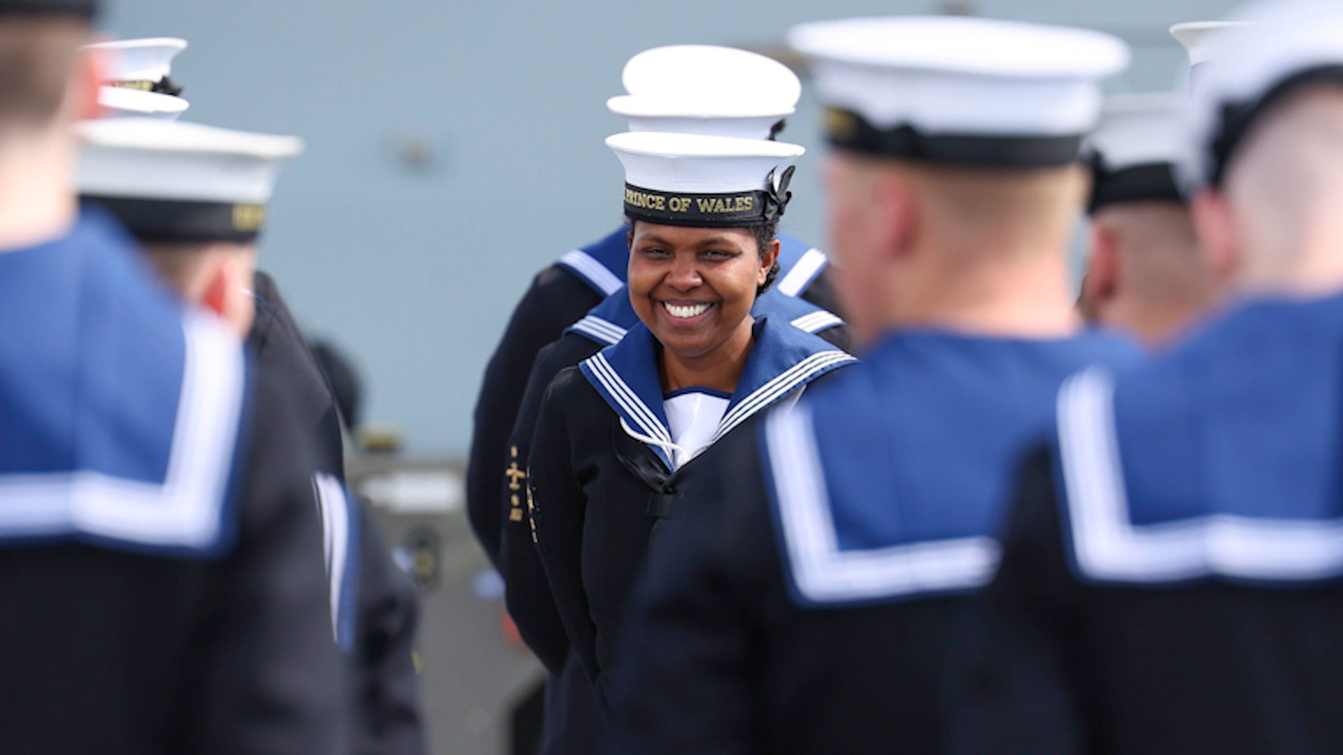 Royal Navy sailor smiles as HMS Prince of Wales leaves Portsmouth 01092023 CREDIT MOD.jpg