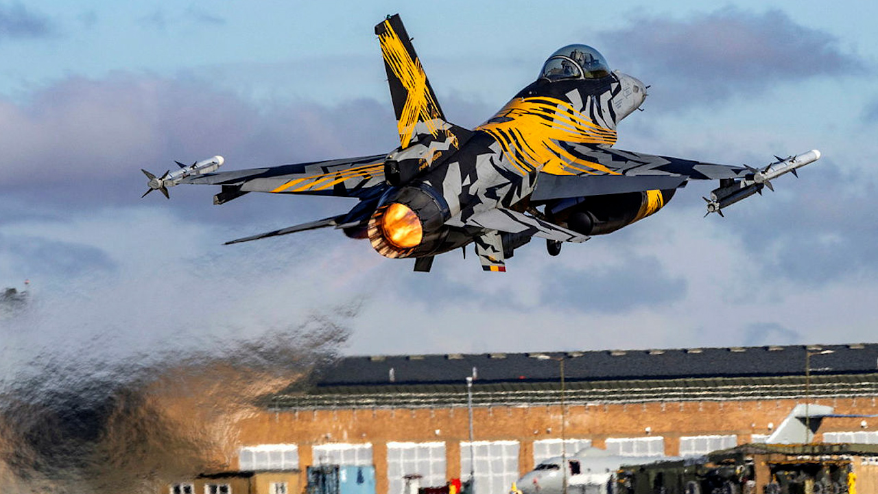 A Belgian air force F-16 Fighting Falcon struts its stuff at RAF Waddington on Exercise Cobra Warrior