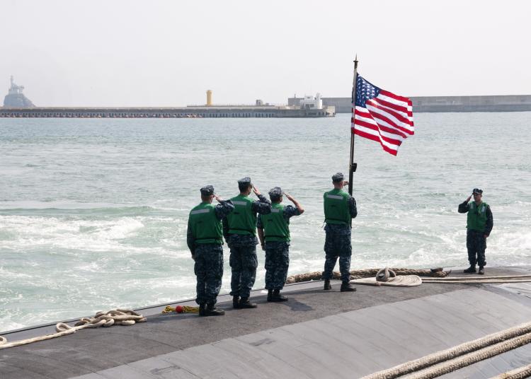 US submariners raising flag South Korea