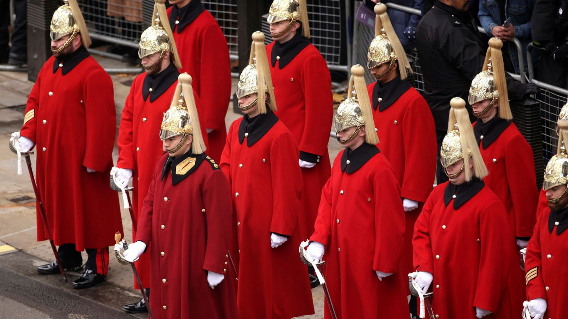 The red cloaks offer the Life Guards, part of the Household Cavalry Mounted Regiment, with protection over the winter months