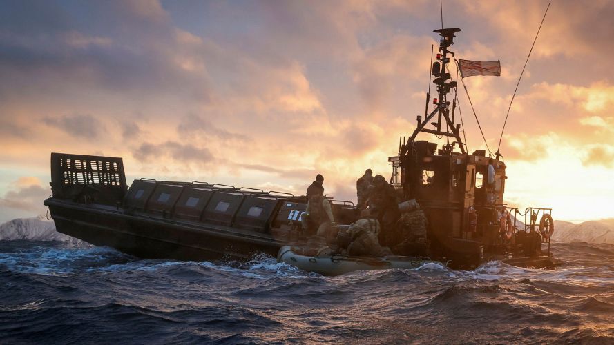 Royal Marines Commando Boat Operators navigating their Landing Craft Vehicle Personnel on the harsh Arctic waters of Norway Royal Marines Commando Boat Operators navigating their Landing Craft Vehicle Personnel on the harsh Arctic waters of Norway