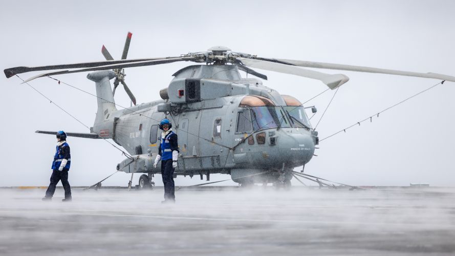 Aircraft handlers secure a Merlin Mk2 on the flight deck of HMS Prince of Wales – the Mk2 is principally an anti-submarine warfare helicopter, although it can carry out other roles, such as search and rescue and maritime patrol Aircraft handlers secure a Merlin Mk2 on the flight deck of HMS Prince of Wales - the Mk2 is principally an anti-submarine warfare helicopter, although it can carry out other roles, such as search and rescue and maritime patrol