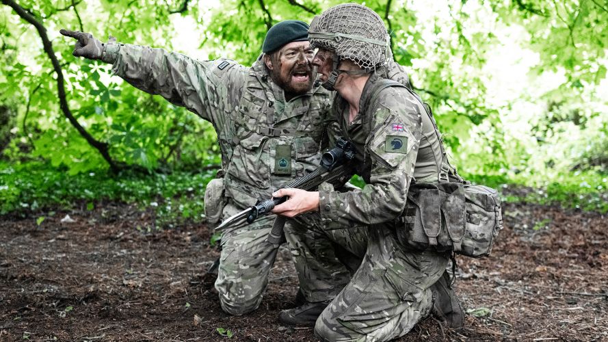 A Rifles WO2 shouts instructions to a competitor at the start of the sword lane – this technique gets the adrenaline pumping and focuses the infanteers on the task ahead A Rifles WO2 shouts instructions to a competitor at the start of the sword lane - this technique gets the adrenaline pumping and focuses the infanteers on the task ahead
