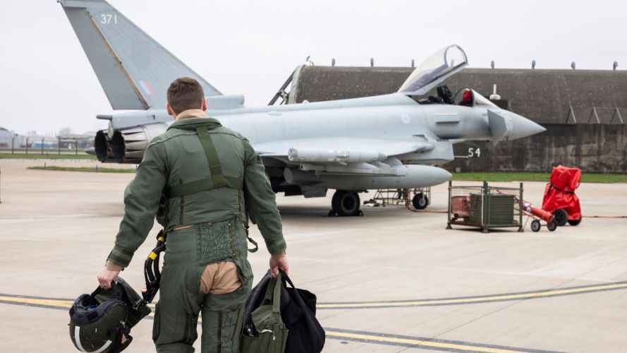 An RAF pilot approaches his Typhoon aircraft at RAF Coningsby, joining those already deployed in Qatar in the wake of Iranian reprisal attacks An RAF pilot approaches his Typhoon aircraft at RAF Coningsby, joining those already deployed in Qatar in the wake of Iranian reprisal attacks