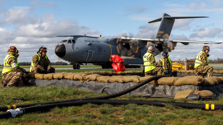Personnel from 1 Expeditionary Logistics Squadron wait by the runway to offload, test and reload fuel from an A400M as part of Exercise Agile Warrior, which tests the RAF's Transition to Conflict capabilities Personnel from 1 Expeditionary Logistics Squadron wait by the runway to offload, test and reload fuel from an A400M as part of Exercise Agile Warrior, which tests the RAF's Transition to Conflict capabilities
