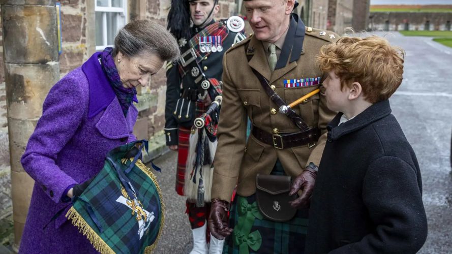 Commanding Officer Lt Col Robert Smith and his son present the Princess Royal with a pipe banner (Picture: MOD) Princess Royal at Fort George