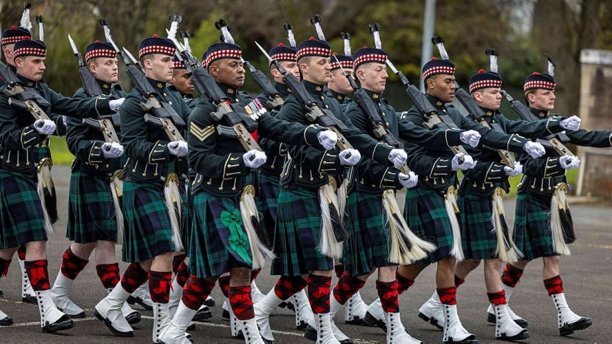 The troops were put through their paces as they paraded in full ceremonial uniform, supported by the Pipes and Drums of the 4th Battalion The troops were put through their paces as they paraded in full ceremonial uniform, supported by the Pipes and Drums of the 4th Battalion