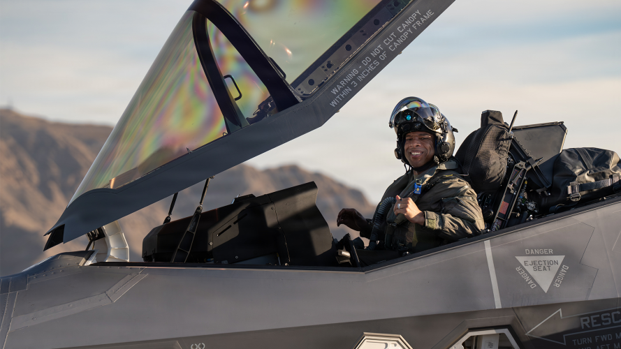 A US Air Force pilot assigned to the 95th Fighter Squadron opens the canopy of an F-35A Lightning A US Air Force pilot assigned to the 95th Fighter Squadron opens the canopy of an F-35A Lightning