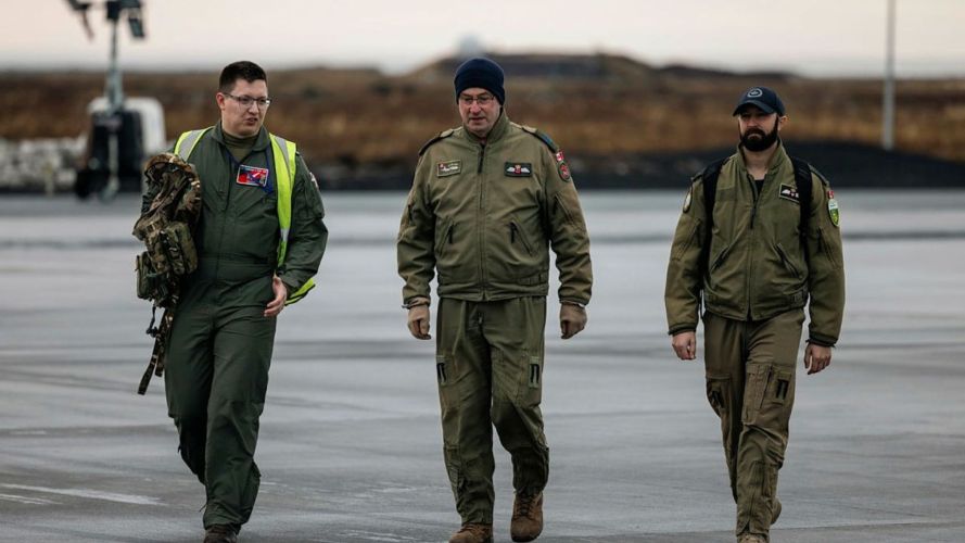 RAF and RCAF personnel walk towards the Poseidon P-8A before an operational sortie (Picture: MOD) RAF and RCAF personnel walk towards the Poseidon MRA1 (P-8A) before an operational sortie