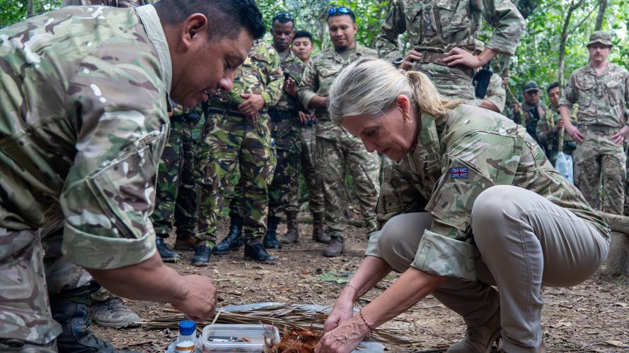 The Duchess of Edinburgh has a go at lighting a fire (Picture: Buckingham Palace) Duchess of Edinburgh tries to light a fire