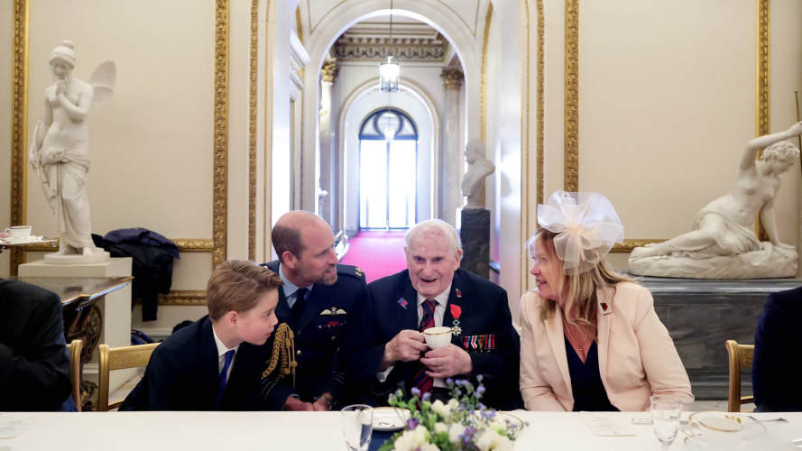Prince George and Prince William speak with a veteran at the 80th anniversary of VE Day (Picture: Kensington Royal) 31122025 CREDIT Prince William and Prince George speak with veterans at the 80th anniversary of VE Day KensingtonRoyal