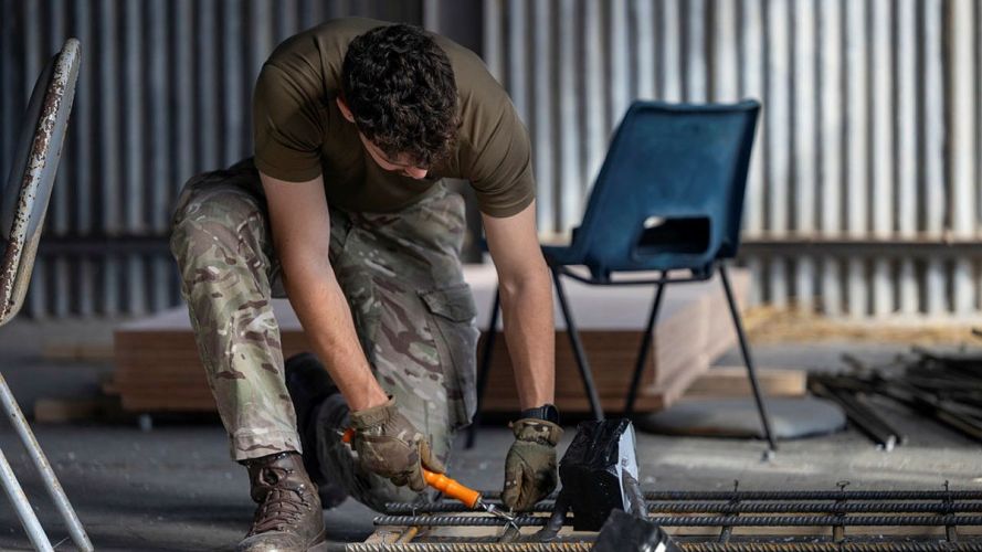Personnel from the Royal Engineers operate under the intense Cyprus sun, carrying out essential construction and engineering tasks in support of British forces Personnel from the Royal Engineers operate under the intense Cyprus sun, carrying out essential construction and engineering tasks in support of British forces