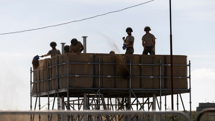 Personnel from the Royal Engineers operate under the intense Cyprus sun, carrying out essential construction and engineering tasks in support of British forces Personnel from the Royal Engineers operate under the intense Cyprus sun, carrying out essential construction and engineering tasks in support of British forces