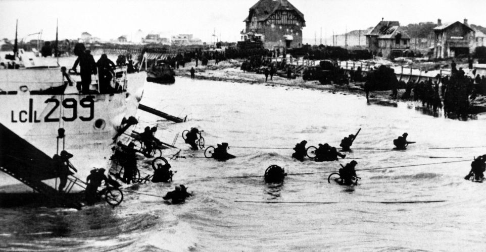 Allied troops wade ashore (Picture: Everett Collection Historical/Alamy Stock Photo). Allied troops wade ashore