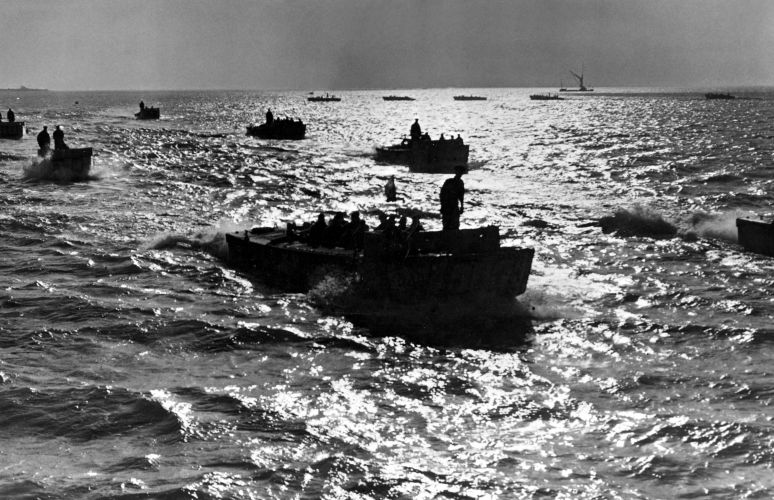 Assault landing crafts carrying Royal Marines form up in the Channel on the night of 5 June 1944, ahead of taking part in the D-Day assault the next morning (Picture: PA). Assault landing crafts carrying Royal Marines form up in the Channel on the night of 5 June 1944, ahead of taking part in the D-Day assault the next morning
