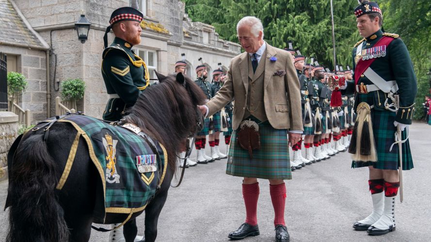 King Charles III meets Shetland pony Cpl Cruachan IV (mascot of the Royal Regiment of Scotland) during an inspection of Balaklava Company, 5th Battalion, The Royal Regiment of Scotland at Balmoral (Picture: PA) Corporal Cruachan IV