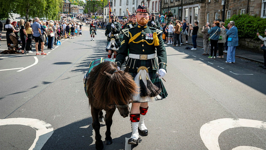Regimental Mascot of the Royal Regiment of Scotland, Cpl Cruachan IV with his handler Corporal Stewart (Picture: MOD) Corporal Cruachan IV