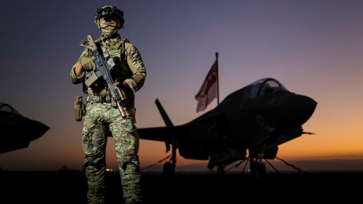 A Commando from 42 Commando Royal Marines as he conducts force protection duties onboard UK Flagship HMS Prince of Wales, as the ship transits through the Suez Canal pic MOD