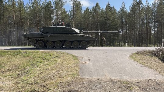 A Challenger 2 tank on the road during Exercise Spring Storm CRED BFBS