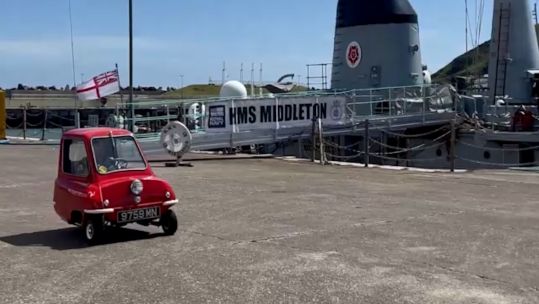 HMS Middleton crew member driving P500 microcar in Isle of Man cred HMS Middleton X