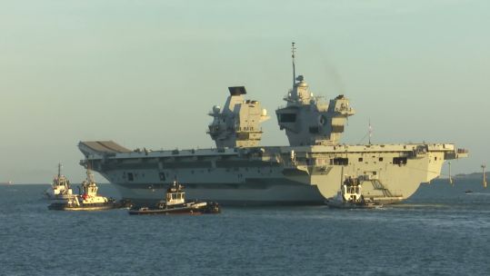 Hundreds of friends and family lined Portsmouth Harbour to wish HMS Queen Elizabeth goodbye (Picture: BFBS)
