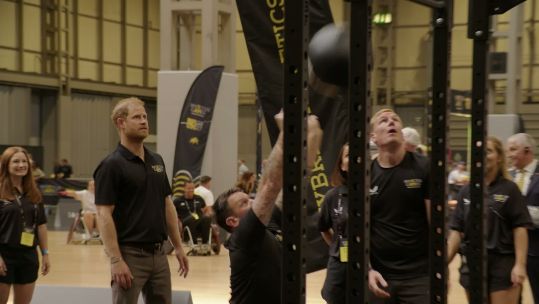 Prince Harry spends time with former colleagues and friends at an event marking one year until Birmingham Invictus Games (Picture: BFBS)