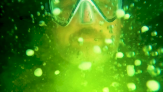 Luxbios underwater lighting illuminating a diver