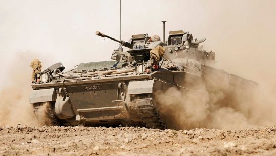 This Warrior from 1st Battalion, The Royal Welsh is being driven in some exceptionally dry conditions in the Drawsko Pomorskie training area in Poland, but needs to versatile enough to be driven in mud or snow as well (Picture: MOD)