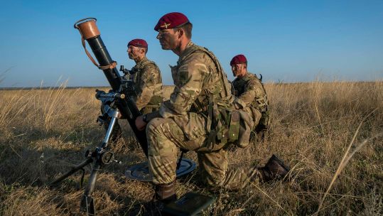 The maroon beret and para wings are intrinsic to the Parachute Regiment, whether or not the airborne soldiers are deployed by chute or by helicopter