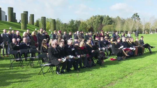 Veterans and families of loved ones gather infront of Bastion Memorial (Picture: BFBS)