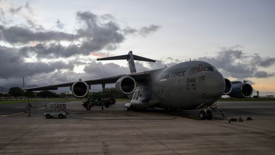 The CIA director was flown to Moscow aboard a C-17 Globemaster in order to send a clear message to Vladimir Putin, according to former military attaché John Foreman (Picture: US Department of War)