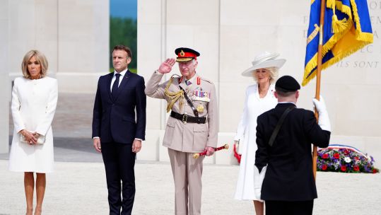 French President Emmanuel Macron with Brigitte and King Charles and Queen Camilla D-Day 80 British Normandy Memorial in Ver-sur-Mer 060624 CREDIT PA