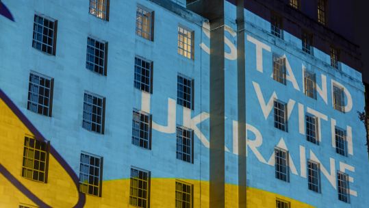 MOD's Main Building lit up with Ukrainian colours and a message of solidarity (Picture: MOD)